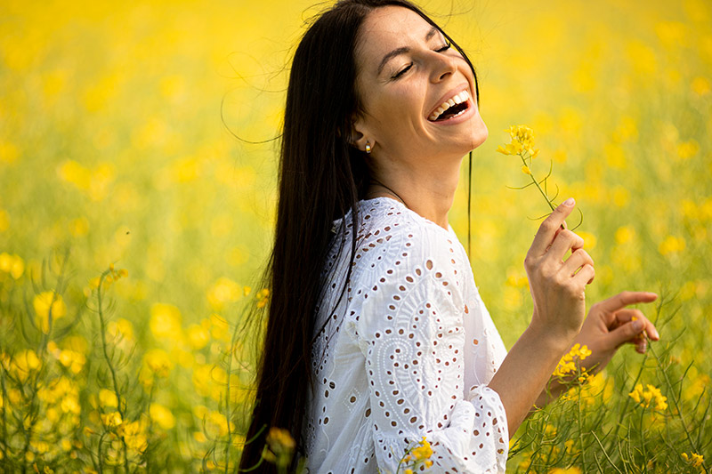 Smiling Woman in Field