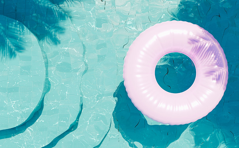 3D rendering of pink inner tube in a pool